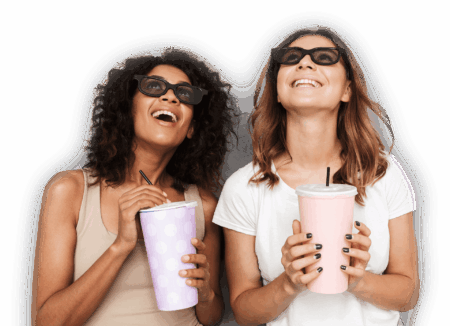 portrait-of-two-smiling-young-women-in-3d-glasses-4L9GB6W